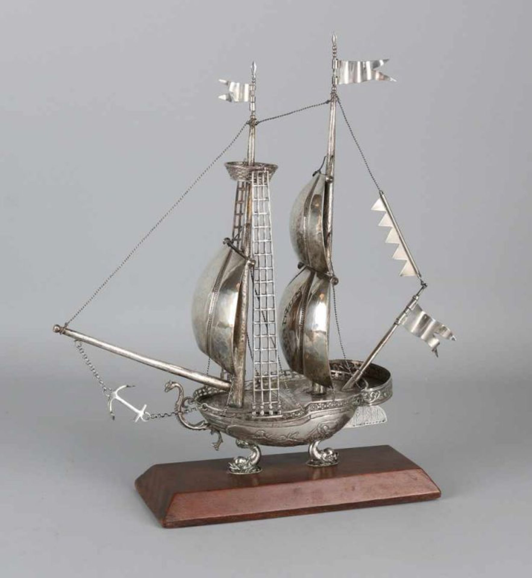 Silver sailing ship, 835/000, on wooden base. Two master's with crow's nest and three sails,