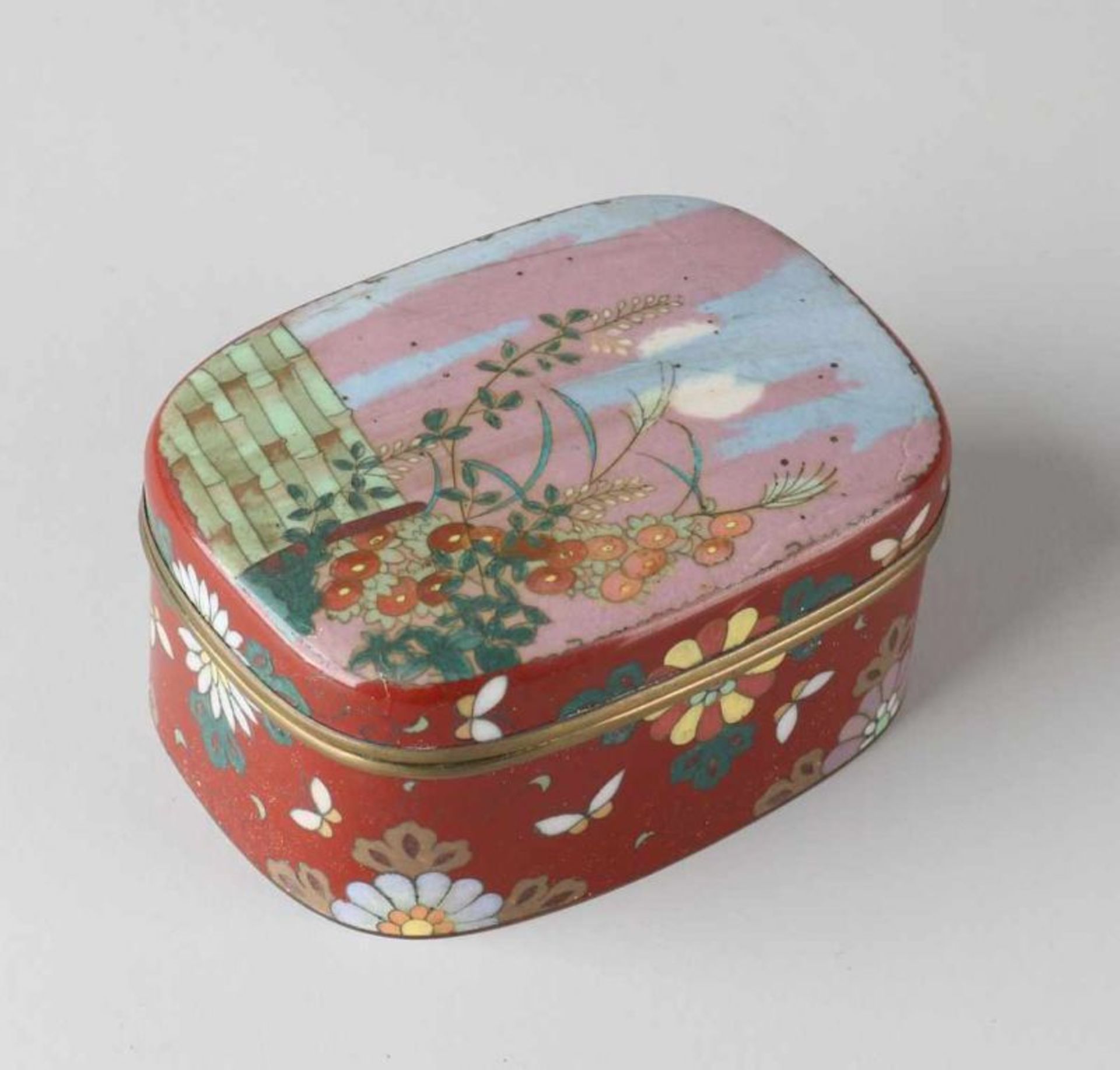 Antique Japanese cloisonne Meiji cover box with floral + butterfly decor. Hairline. Dimensions: 4.