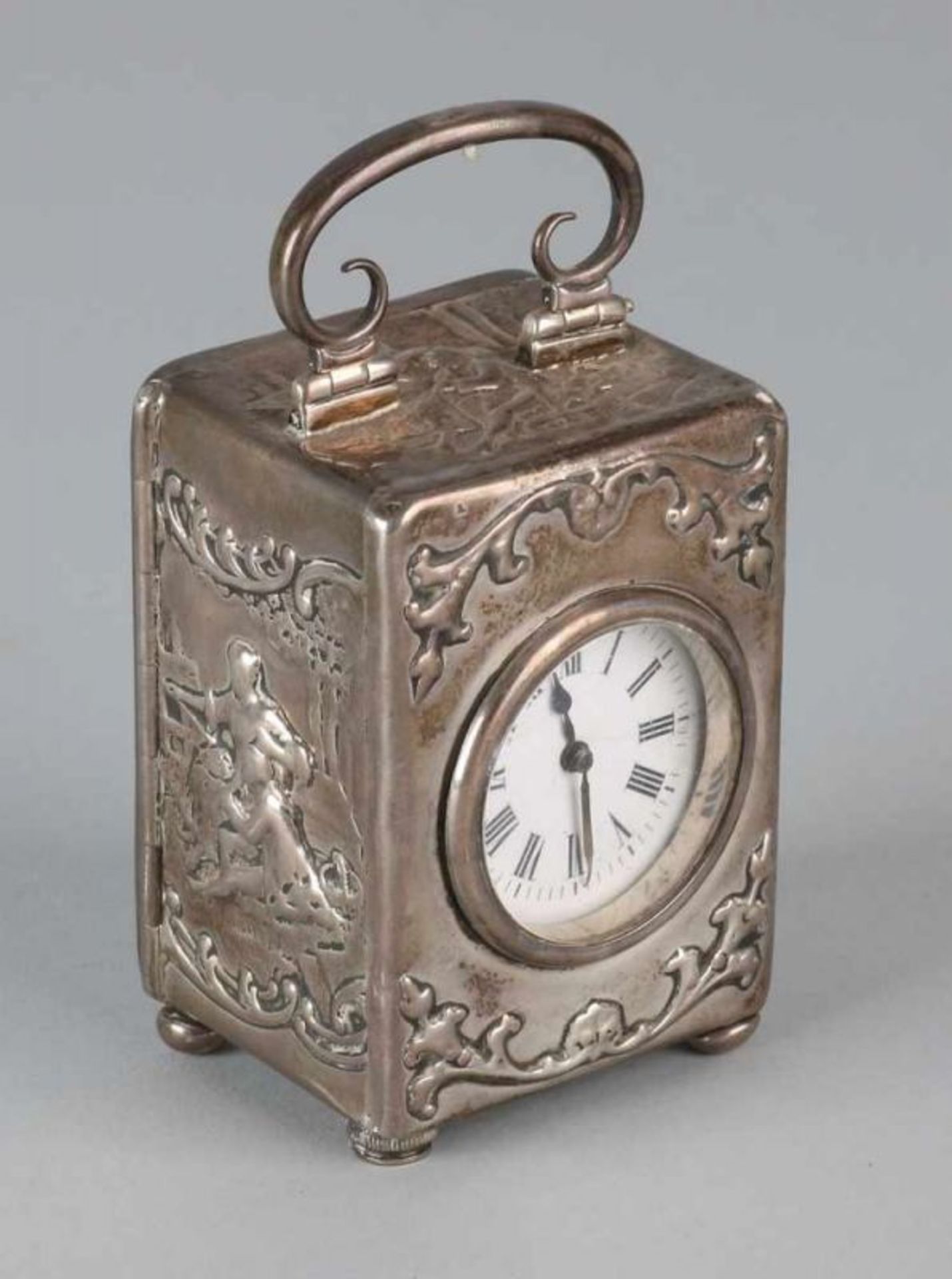 Silver table clock, 925/000, rectangular model with representations with figures. Placed on 4