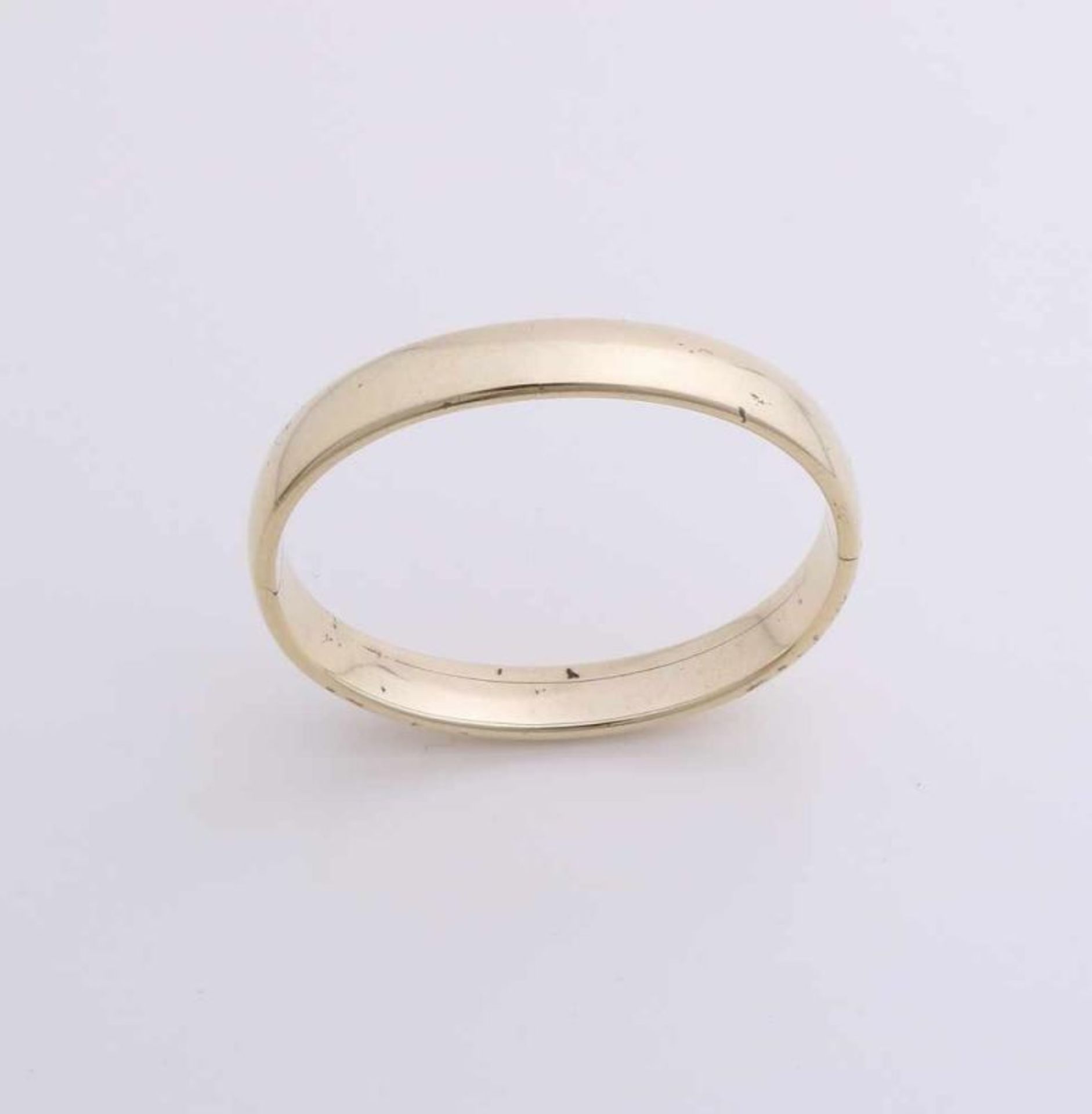 Yellow gold slave band, 585/000, slightly convex, 10 mm wide with a hinge. 60x52mm. 20 grams.