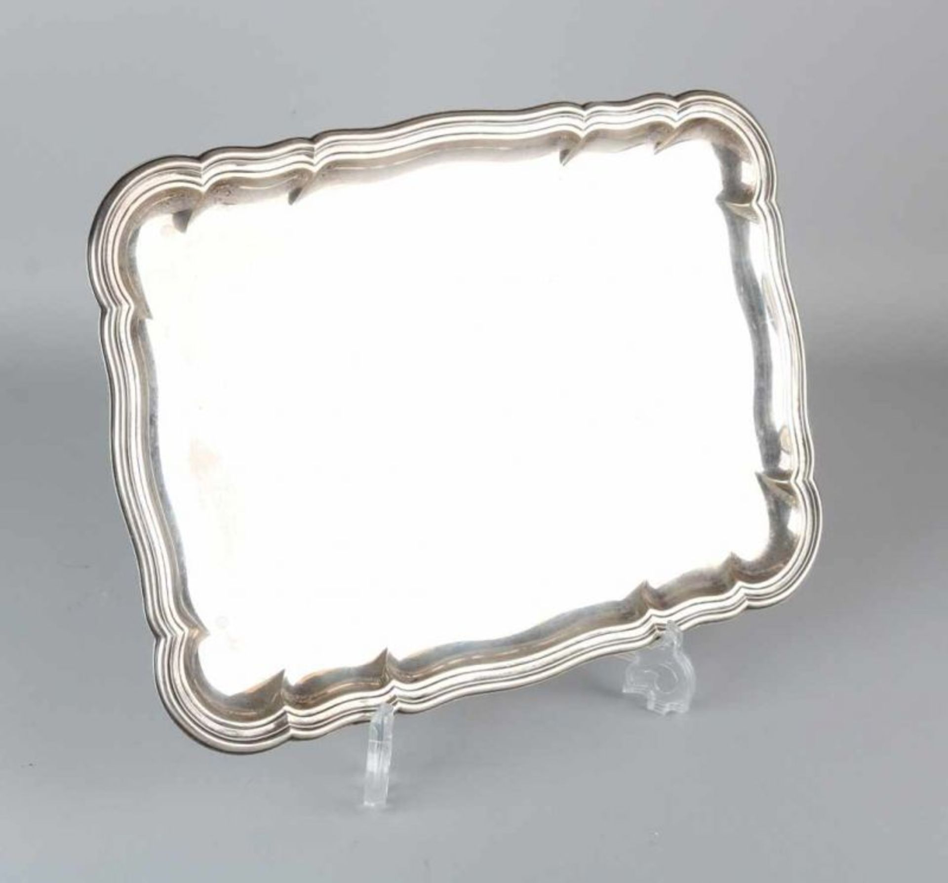 Silver tray, 835/000, rectangular contoured with a somewhat raised worked edge. Equipped with