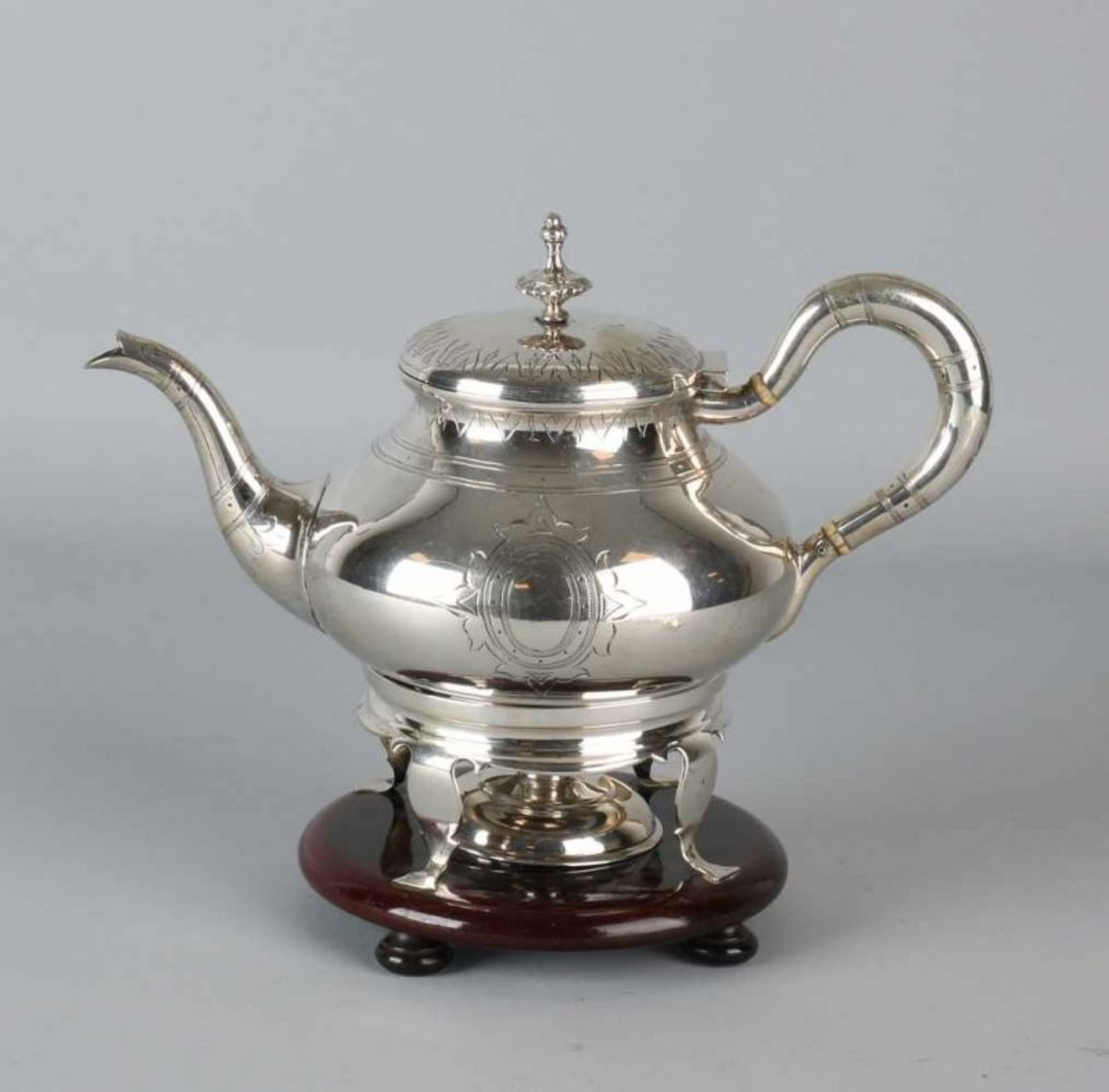 Silver 835/000 teapot on matching 835/000 silver stove with original 835/000 silver burner on wooden