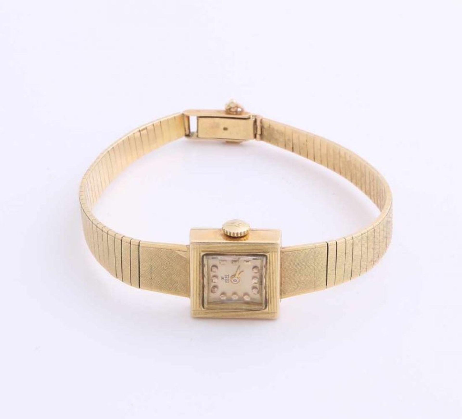 Yellow gold Ebel watch, 750/000, with a square case, 15x15mm, and a maturing strap, with folding