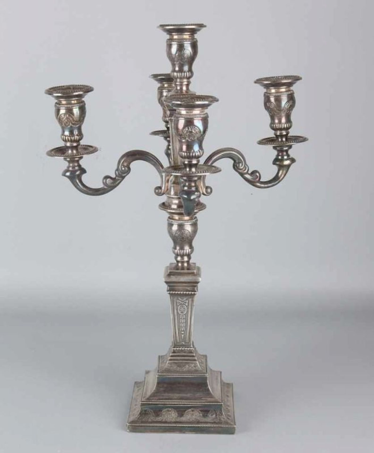 Beautiful silver table candlestick, 925/000, 4 arms, placed on a square base decorated with engraved