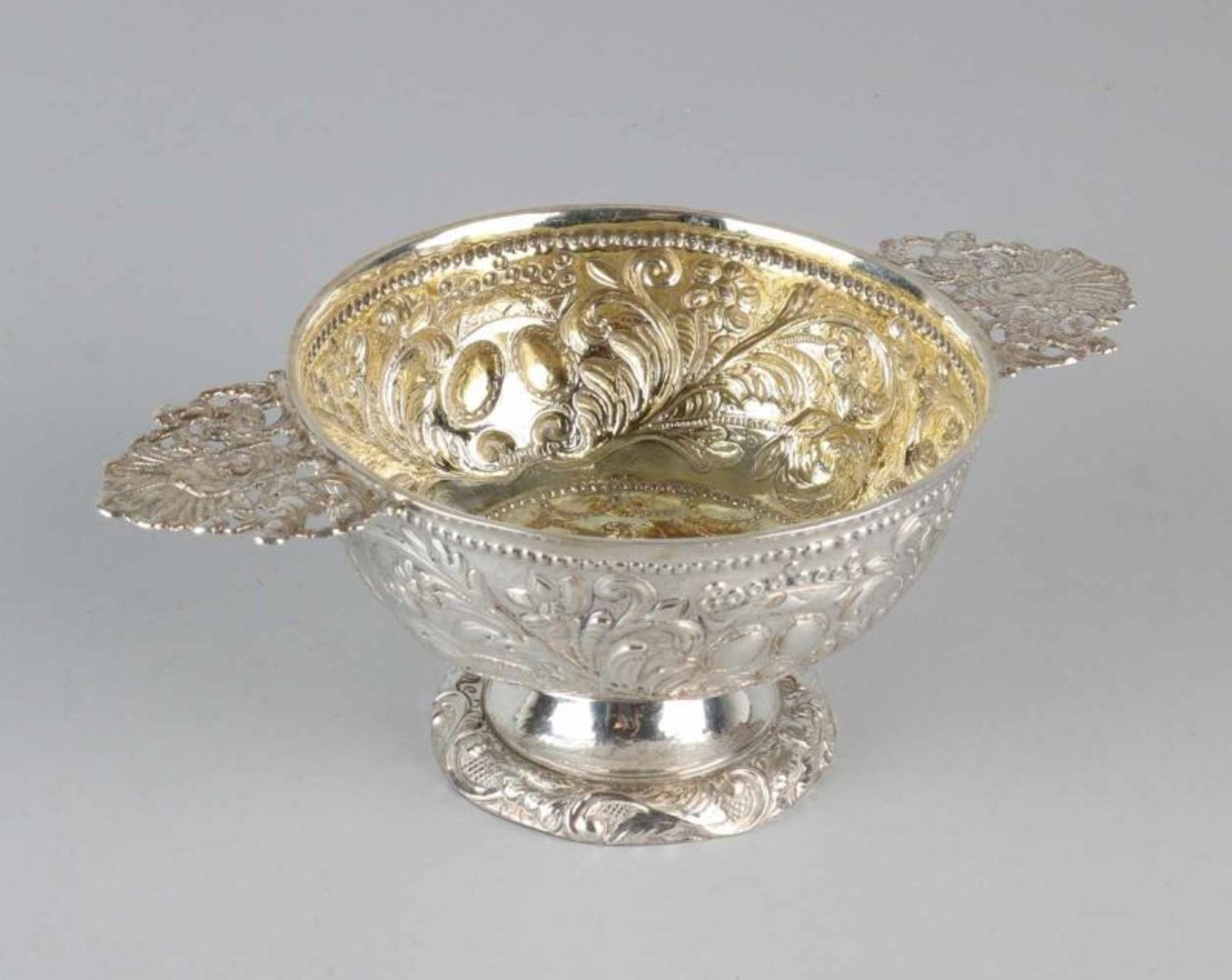 Silver brandy bowl, 934/000, round model, decorated with floral motifs, with vermeille inside,