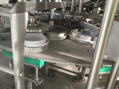 POT FILLING AND PACKAGING MACHINE