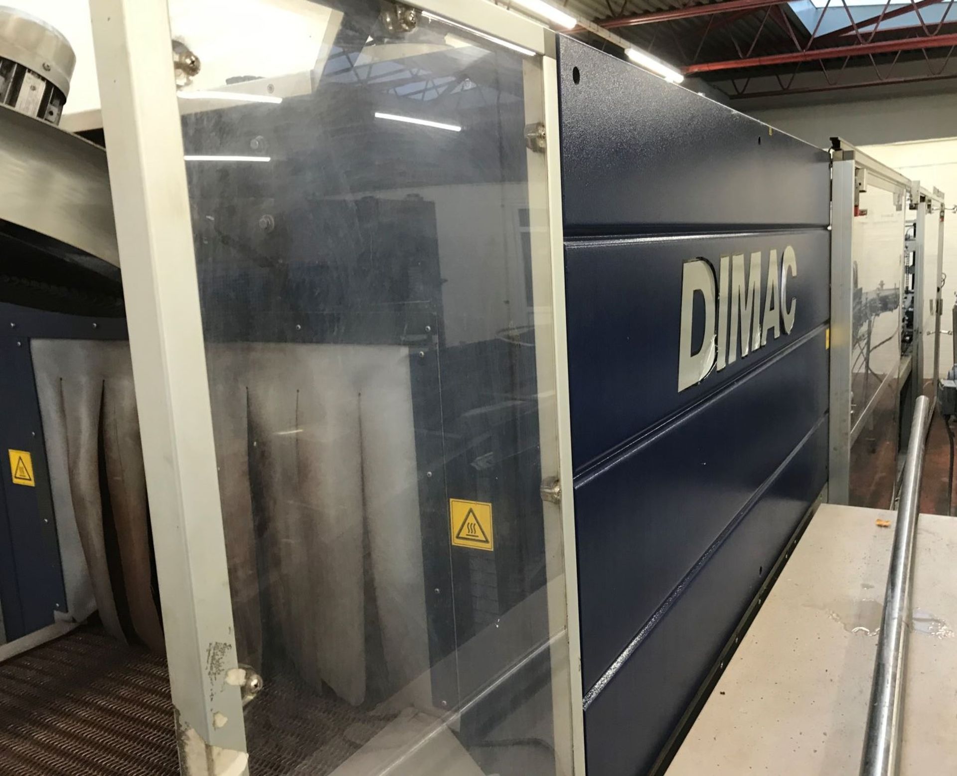 DIMAC SHRINK WRAPPING MACHINE WITH SEPARATION SYSTEM