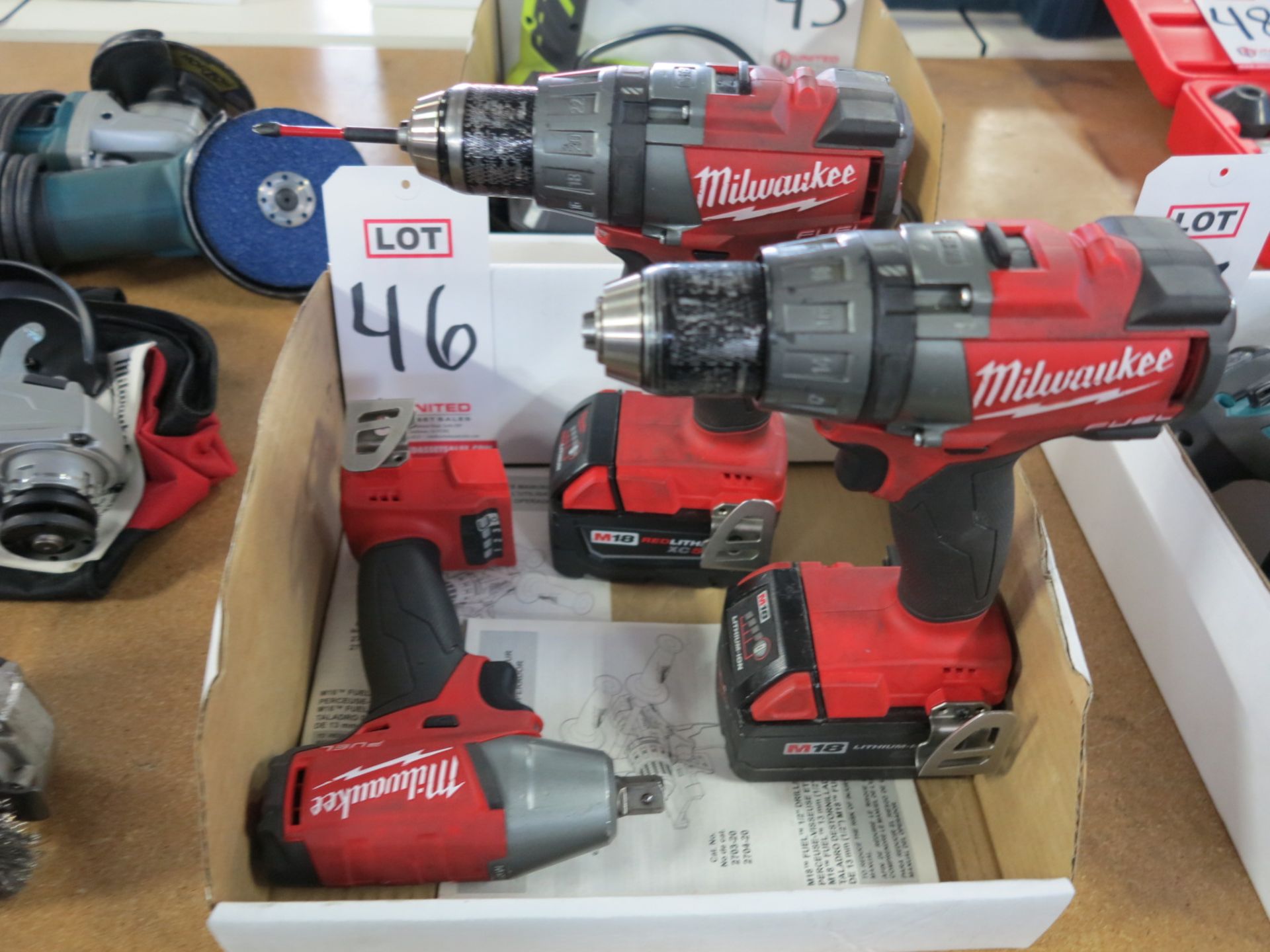 LOT- (2) MILWAUKEE 1/2" DRILLS, CAT. NO. 2703-20, BOTH W/ M18 EXTENDED BATTERIES AND (1) MILWAUKEE