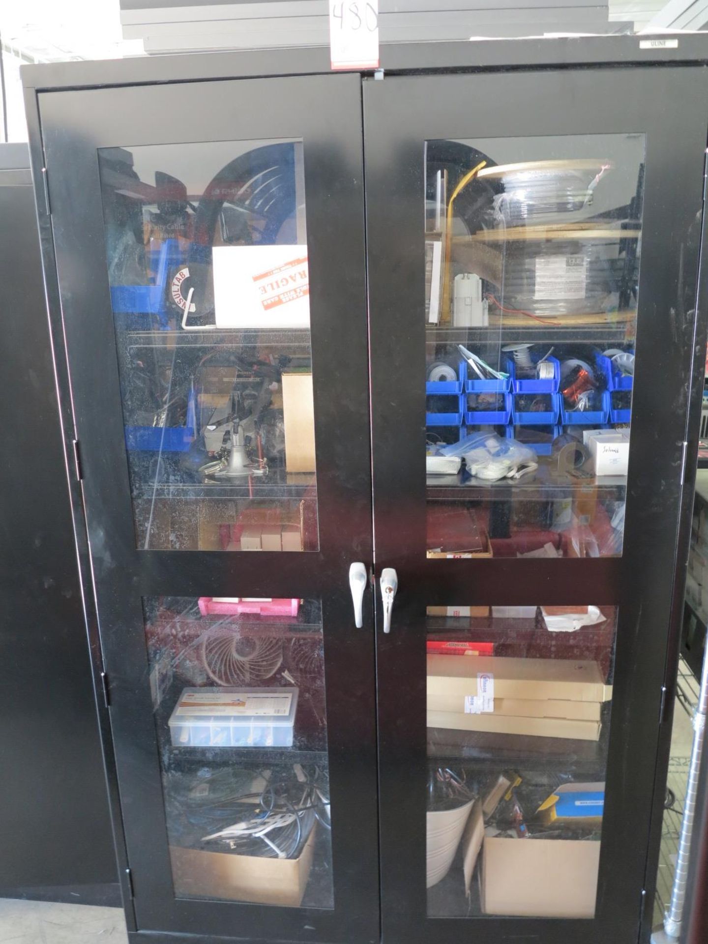 LOT - ULINE 2-DOOR CABINET FULL OF MISC ELECTRICAL AND ELECTRONICS PARTS AND COMPONENTS, CONTENTS