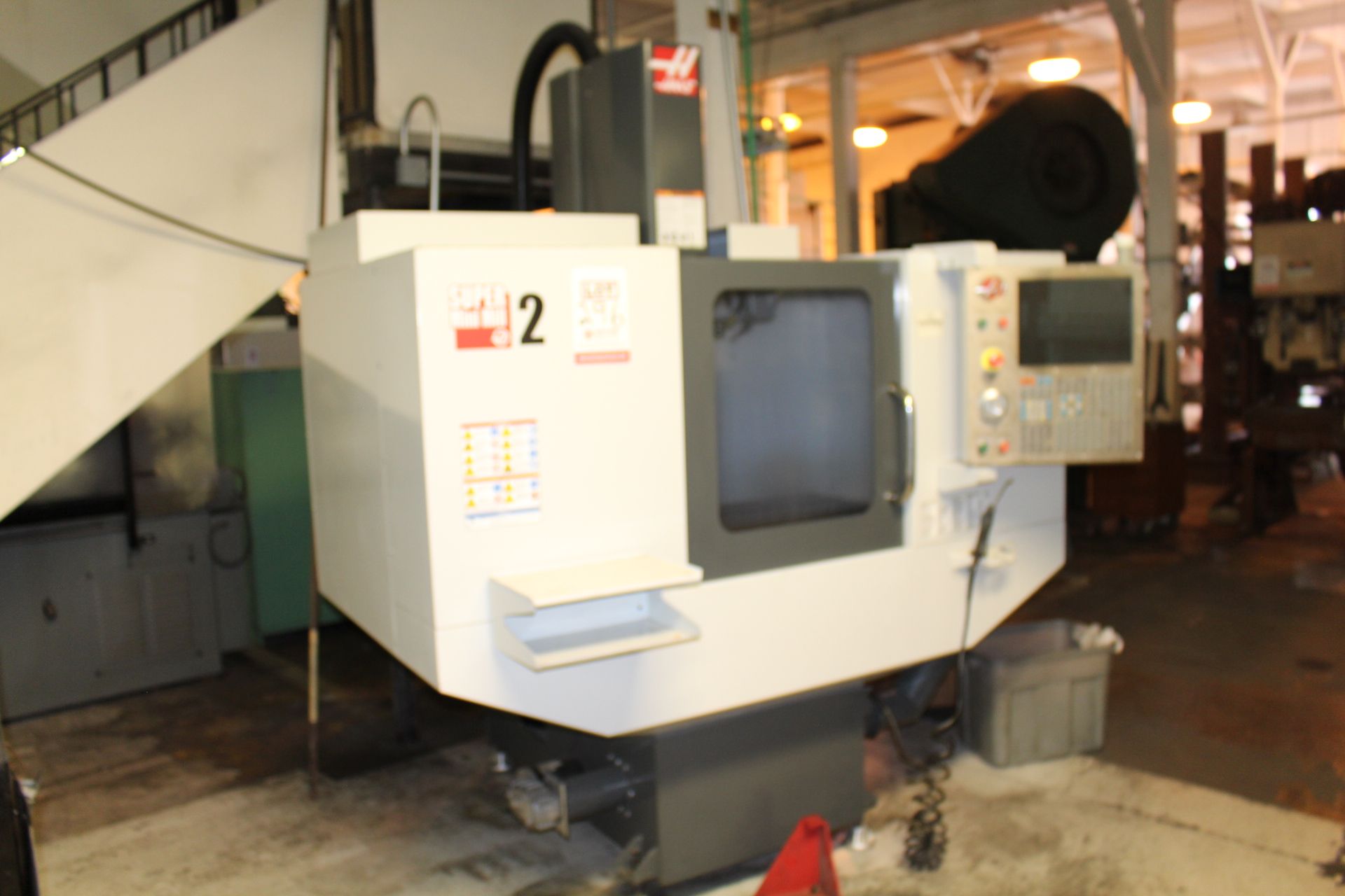 2012 HAAS SUPERMINI MILL 2 CNC VERTICAL MILL, S/N 1097695, 20" X, 16" Y, 14" Z, 40" X 14" TABLE,