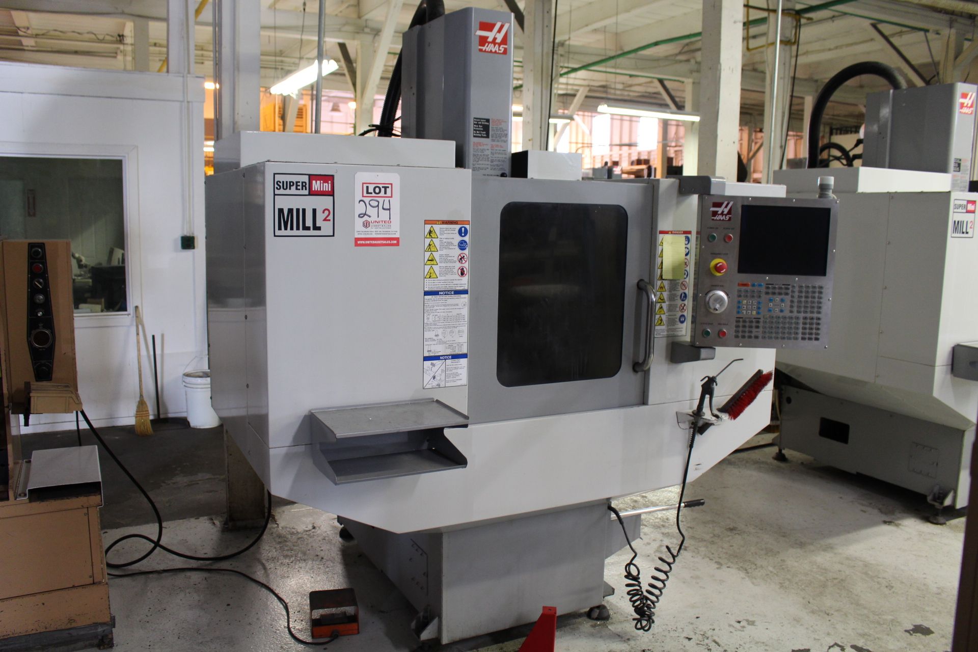 2009 HAAS SUPERMINI MILL 2 CNC VERTICAL MILL, S/N 1073933, 20" X, 16" Y, 14" Z, 40" X 14" TABLE,