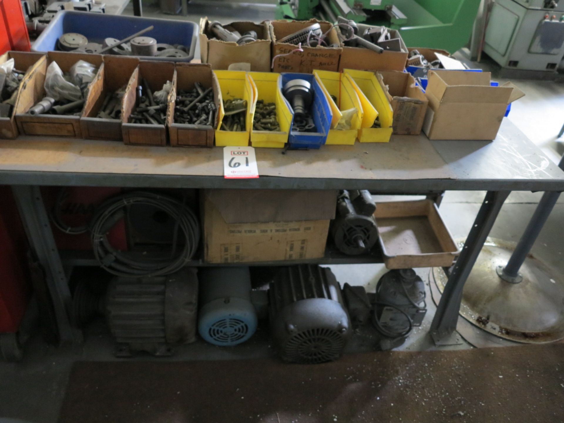 LOT - TABLE, W/ CONTENTS TO INCLUDE: ELECTRIC MOTORS, BOLTS, CHUCK JAWS AND MISC PARTS