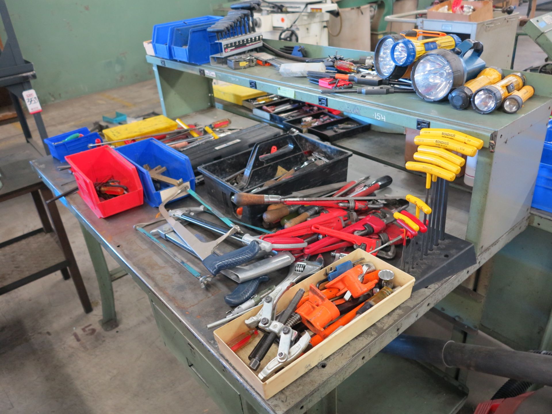 5' STEEL WORKBENCH WITH LARGE ASSORTMENT OF HAND TOOLS INCLUDING APPROX 5 TORQUE WRENCHES, ETC.