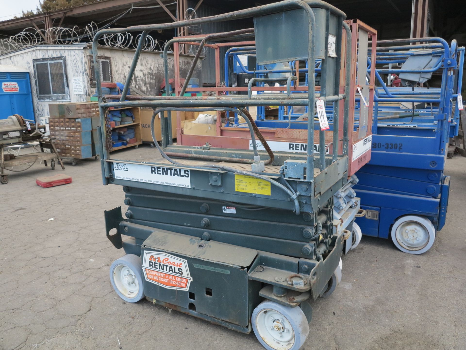 SCISSOR LIFT, 26" X 64" PLATFORM (OUT OF SERVICE)