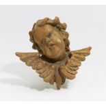 KLEINER CHERUBKOPF. Süddeutschland. Lindenholz, geschnitzt. H.22,5, B.25cm. Zustand A.