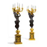 PAIR OF LARGE GILT AND PATINATED-BRONZE CANDELABRA WITH VICTORIES EMPIRE STYLE. France. After a