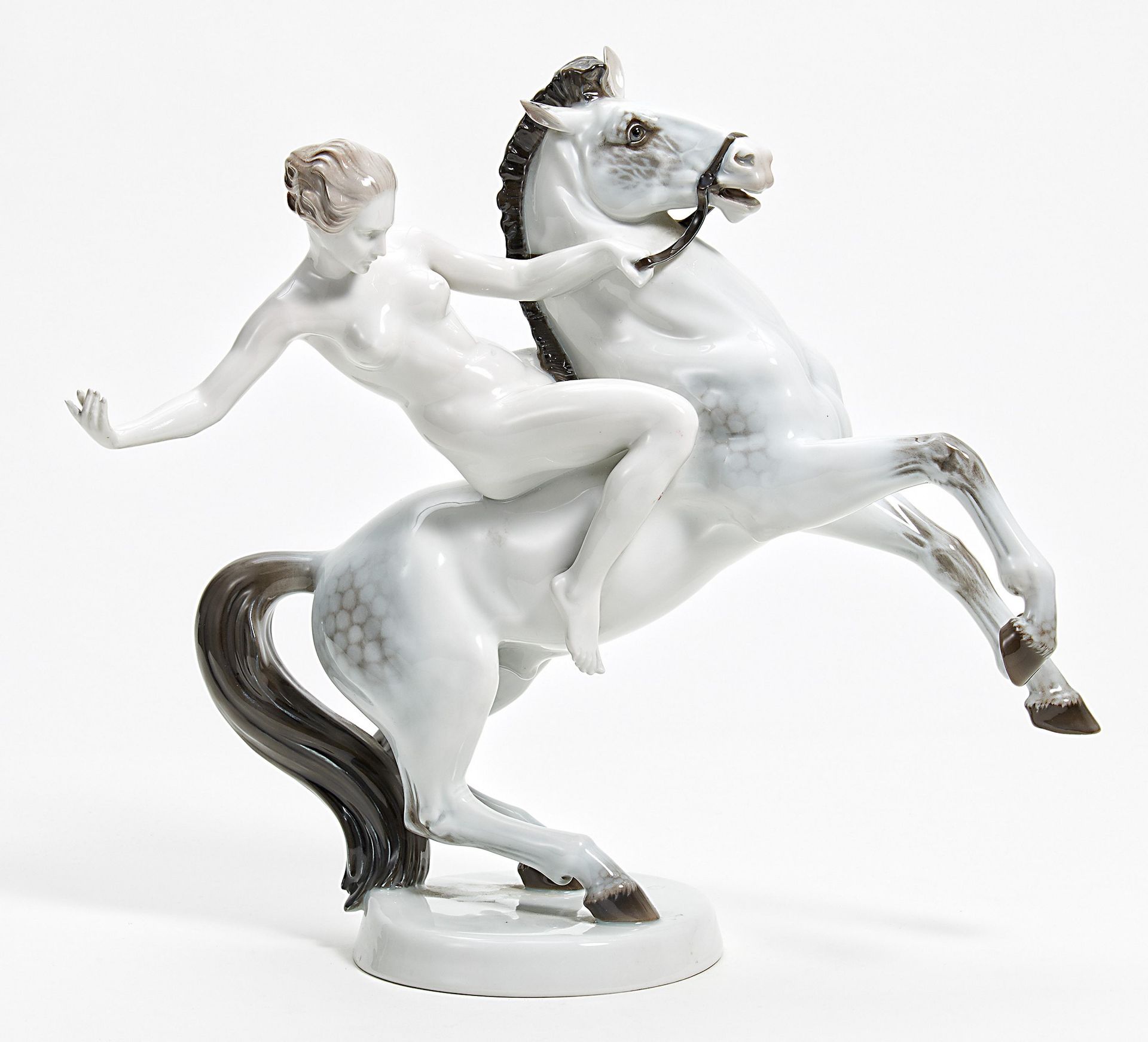 PORCELAIN FIGURE OF AN AMAZON ON HORSEBACK. Rosenthal. Selb. 1934-1956. Modell A. Grath.