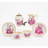 PORCELAIN ENSEMBLE FROM A SERVICE WITH DELICATE WATTEAU SCENES IN PURPLE CAMAIEU DECOR. Meissen.