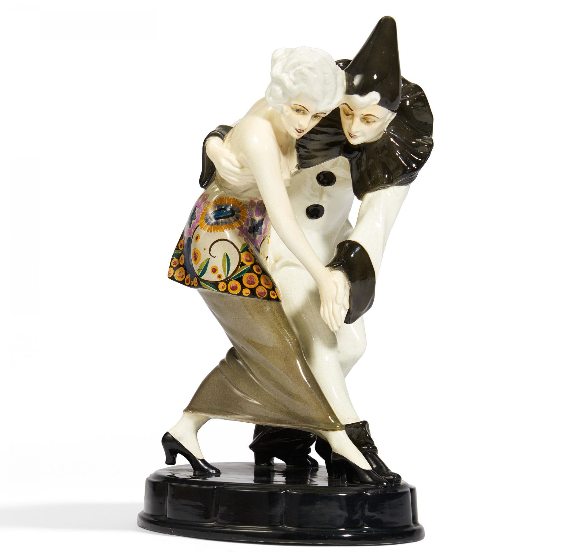 CERAMIC FIGURINE OF PIERROT DANCING WITH A LADY. Goldscheider, Friedrich. Vienna. Execution ca.