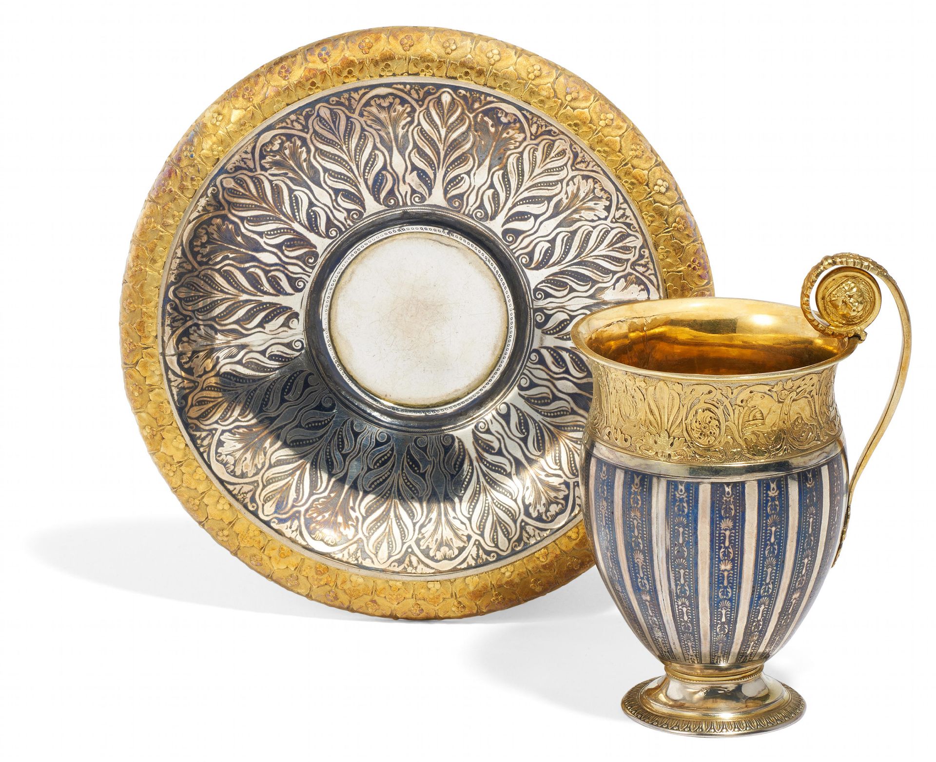 GILDED SILVER CUP AND SAUCER FROM THE EMPIRE PERIOD WITH NIELLO DECOR. Berlin. 1819-1842. Silver