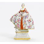 PORCELAIN FIGURINE OF A LADY FROM THE ORDER OF THE PUG. Meissen. 19th century. Model J.J.