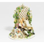 PORCELAIN ENSEMBLE OF LOVERS WITH PUG UNDER ARBOUR. Meissen. 18th century. Model J.J. Kaendler and