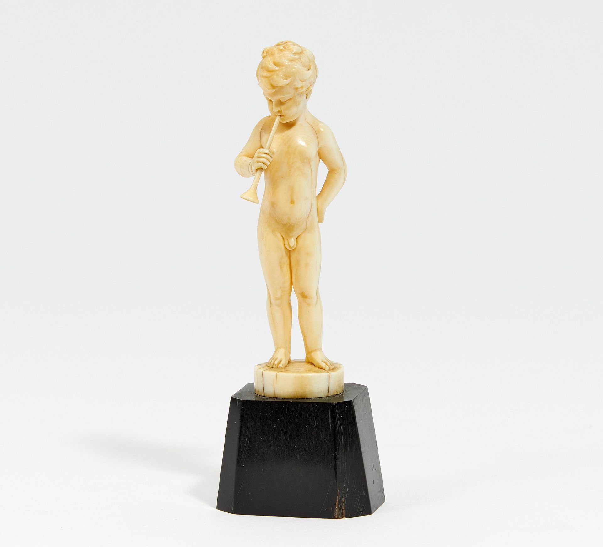 IVORY FIGURINE OF YOUNG BOY WITH TRUMPET. Preiss, Ferdinand. 1892 Erbach - 1943 Berlin. 1920s.
