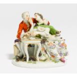 PORCELAIN ENSEMBLE OF FREEMASON AND LADY DRINKING CHOCOLATE. Meissen. Model J.J. Kaendler.