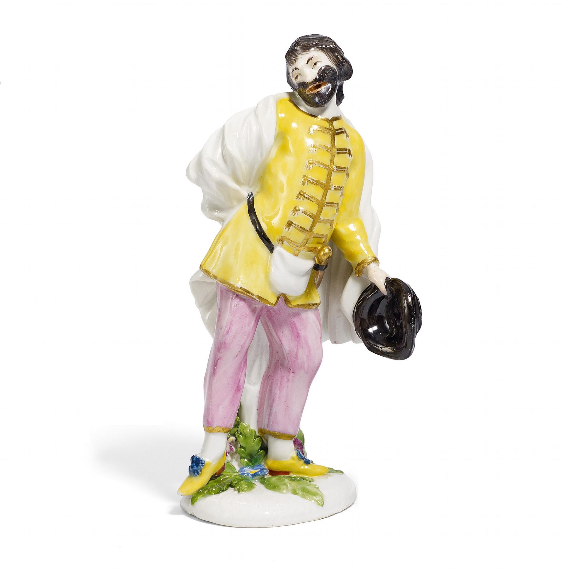 PORCELAIN FIGURINE OF SCAPIN FROM THE COMMEDIA DELL'ARTE. Meissen. 18th century. Model P. Reinicke