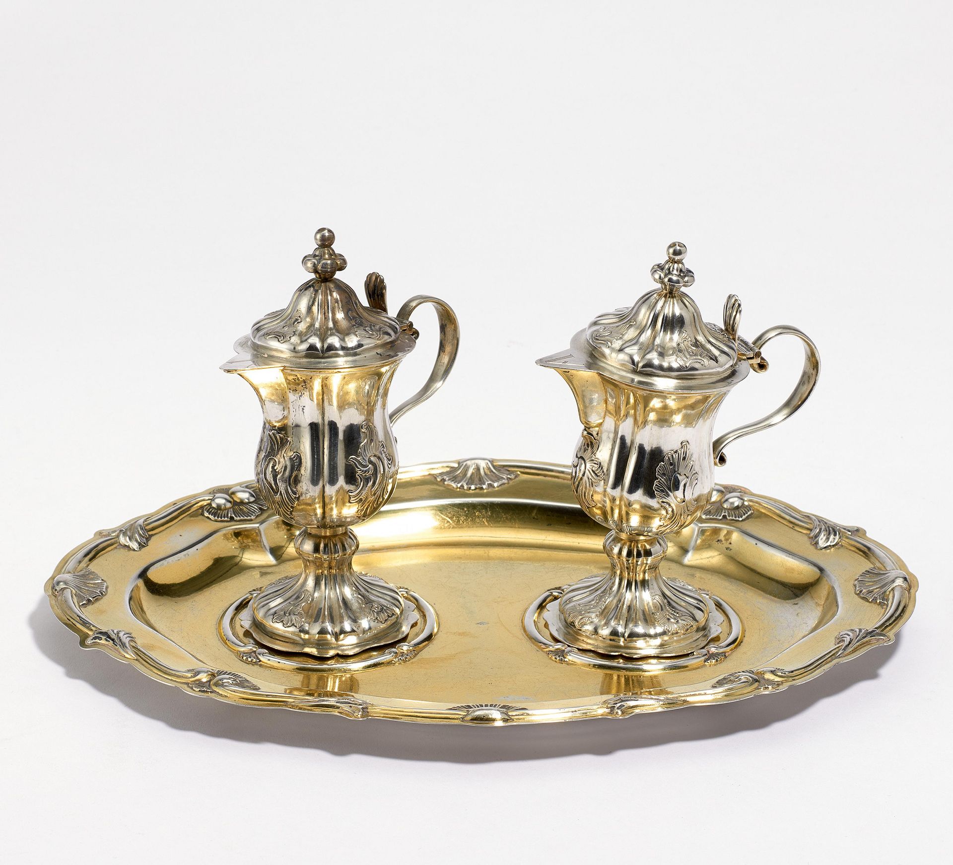 GILDED SILVER COMMUNION GARNITURE. Presumably France. Silver, gold-plated respectively with leftover