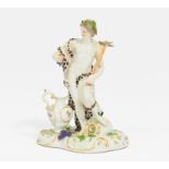 SMALL PORCELAIN FIGURINE OF BACCHUS AS AN ALLEGORY OF AUTUMN. Meissen. 18th century. Model J.J.