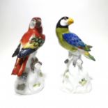 TWO PORCELAIN PARROTS ON TREE STUMPS. Meissen. Model J.J. Kaendler. Porcelain, enriched in