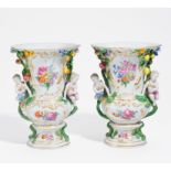 PAIR OF PORCELAIN BALUSTER VASES WITH CUPIDS. Meissen. 19th century. Model J.J. Kaendler. Porcelain,