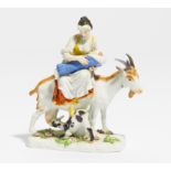 PORCELAIN FIGURE OF A SEAMSTRESS RIDING ON A GOAT. Meissen. Modell J.F. Eberlein, 1740. Porzellan,