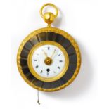 SMALL, GILDED AND PARTLY PATINATED BRONZE CARTEL CLOCK "OEIL DE BOEUF". Paris. Ca. 1800. Bronze