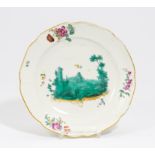 PORCELAIN PLATE WITH LANDSCAPE DEPICTION IN GREEN CAMAIEU DECOR. Frankenthal. Um 1755-1762.