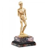 IVORY MEMENTO MORI FIGURE. Germany. Presumably 19th century. Ivory carved. Base lined with marble.