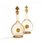 PAIR OF HISTORICISM GLASS CARAFES. Murano. 19th century. Brownish glass with gold inclusions. In the