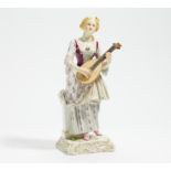 LARGE PORCELAIN FIGURINE OF A WOMAN PLAYING MANDOLINE. Meissen. 19th century. Porcelain, enriched in