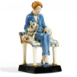 CERAMIC FIGURINE OF LADY SITTING WITH DOGS. Goldscheider, Friedrich. Vienna. Execution ca. 1930-