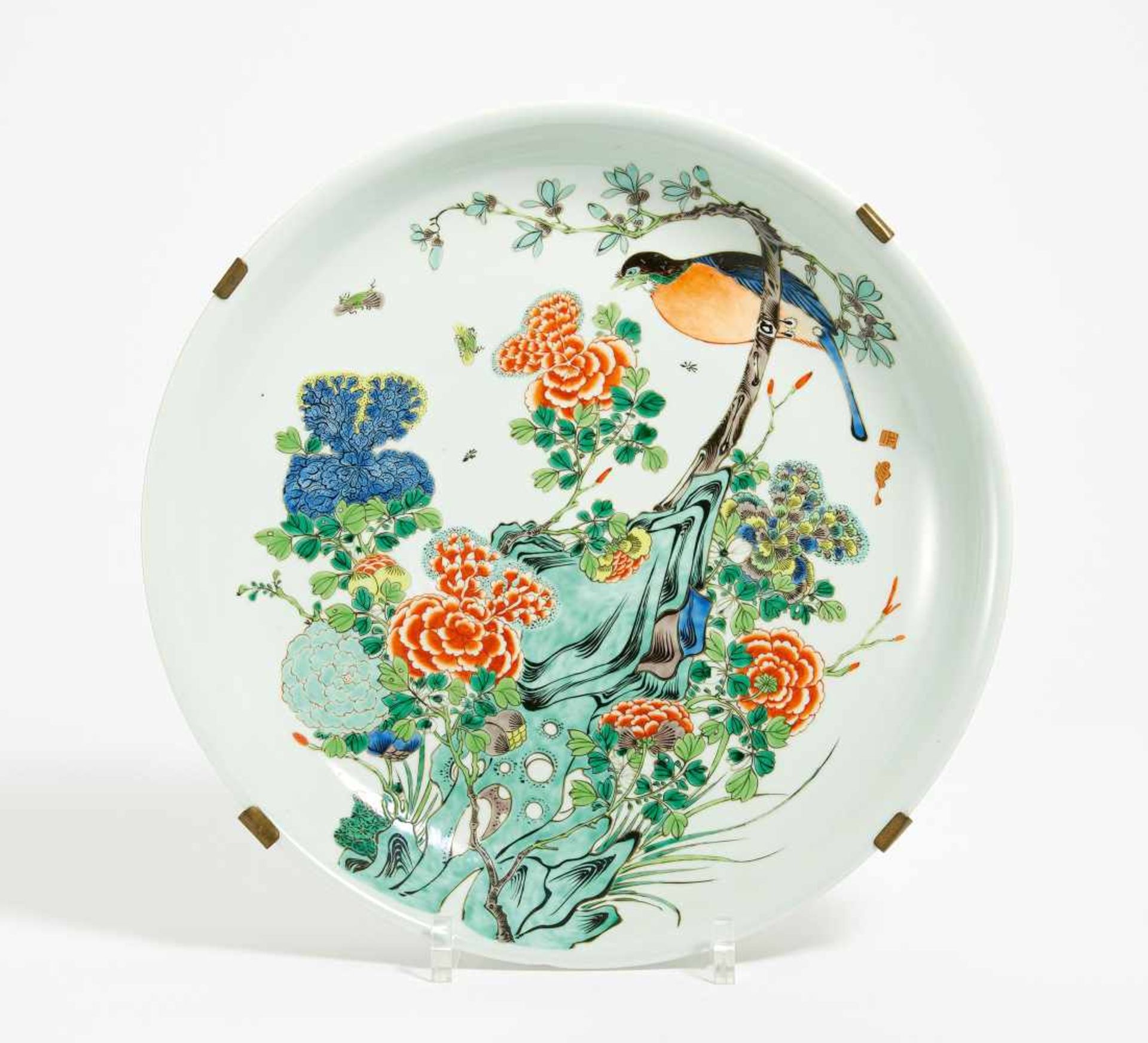 LARGE DISH WITH PARADISE BIRD AND PEONIES. China. 20th c. In the style of the Kangxi period.