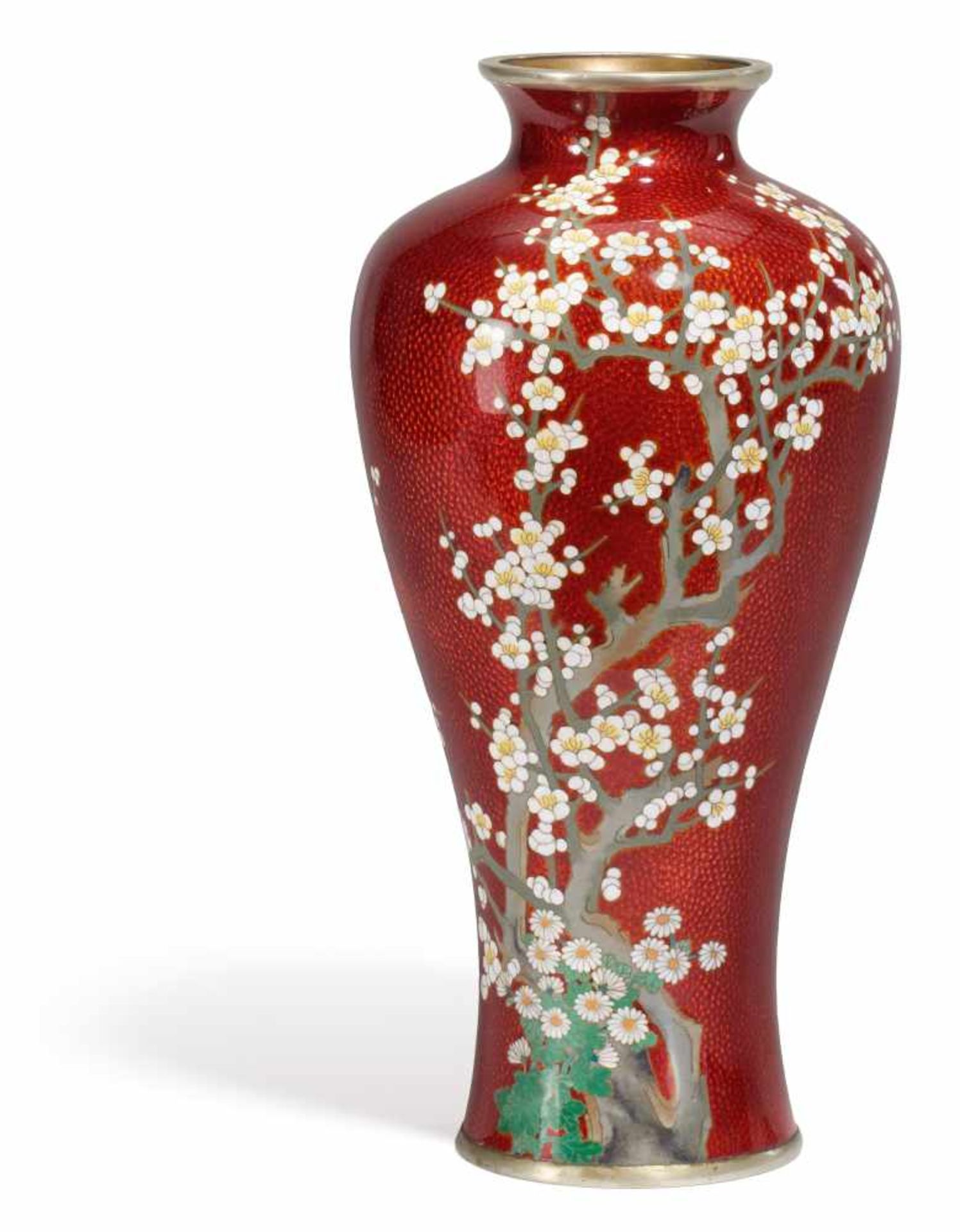 RARE PIGEON BLOOD RED VASE WITH BLOOMING PLUMS. Japan. Meiji period (1868-1912). Cloisonné on