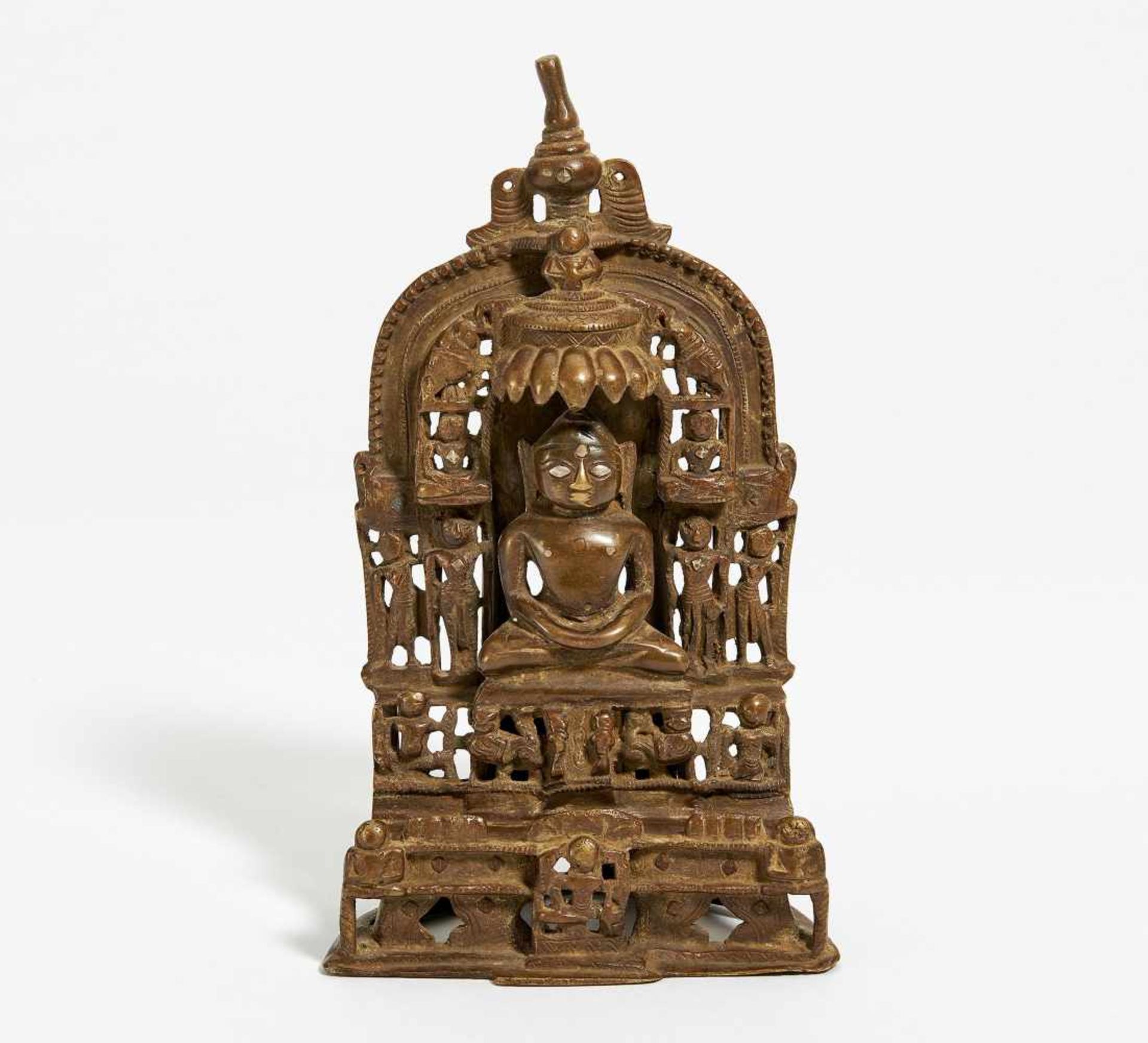TIRTHANKARA ALTAR. India. Jain. Copper bronze with inlays from copper, silver and residue of