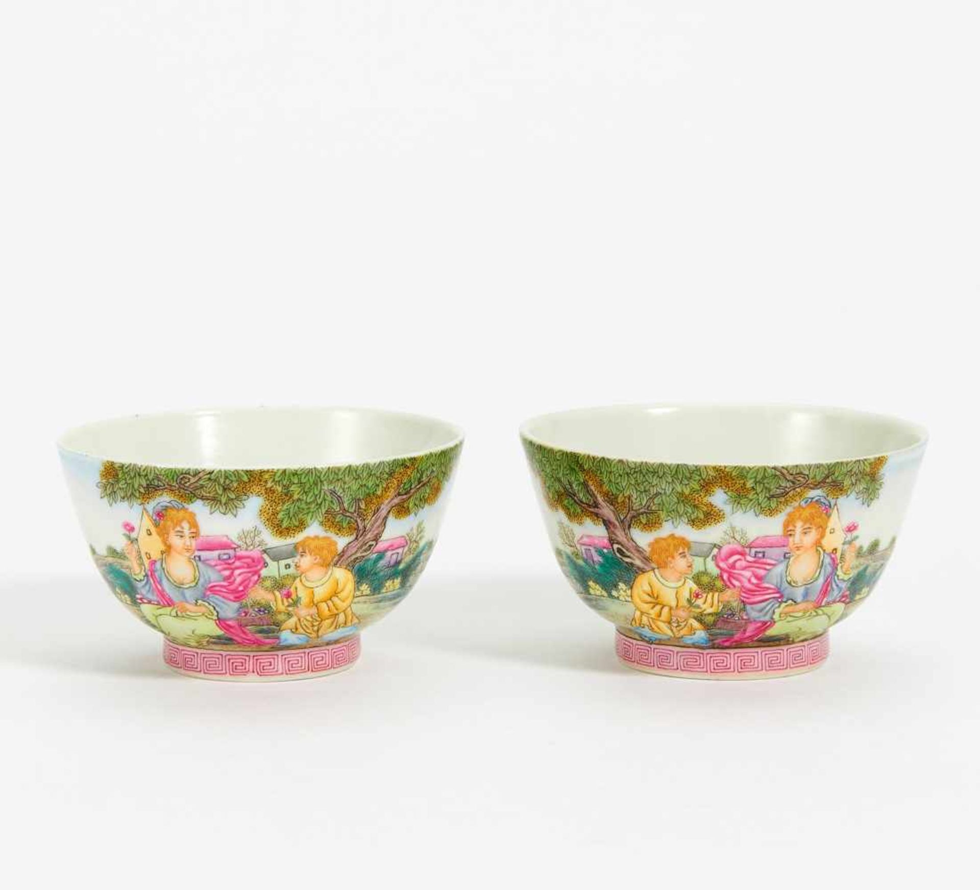 PAIR OF CUPS WITH WESTERN LOVERS. China. In the style of Qianlong period. 20th c. Porcelain,