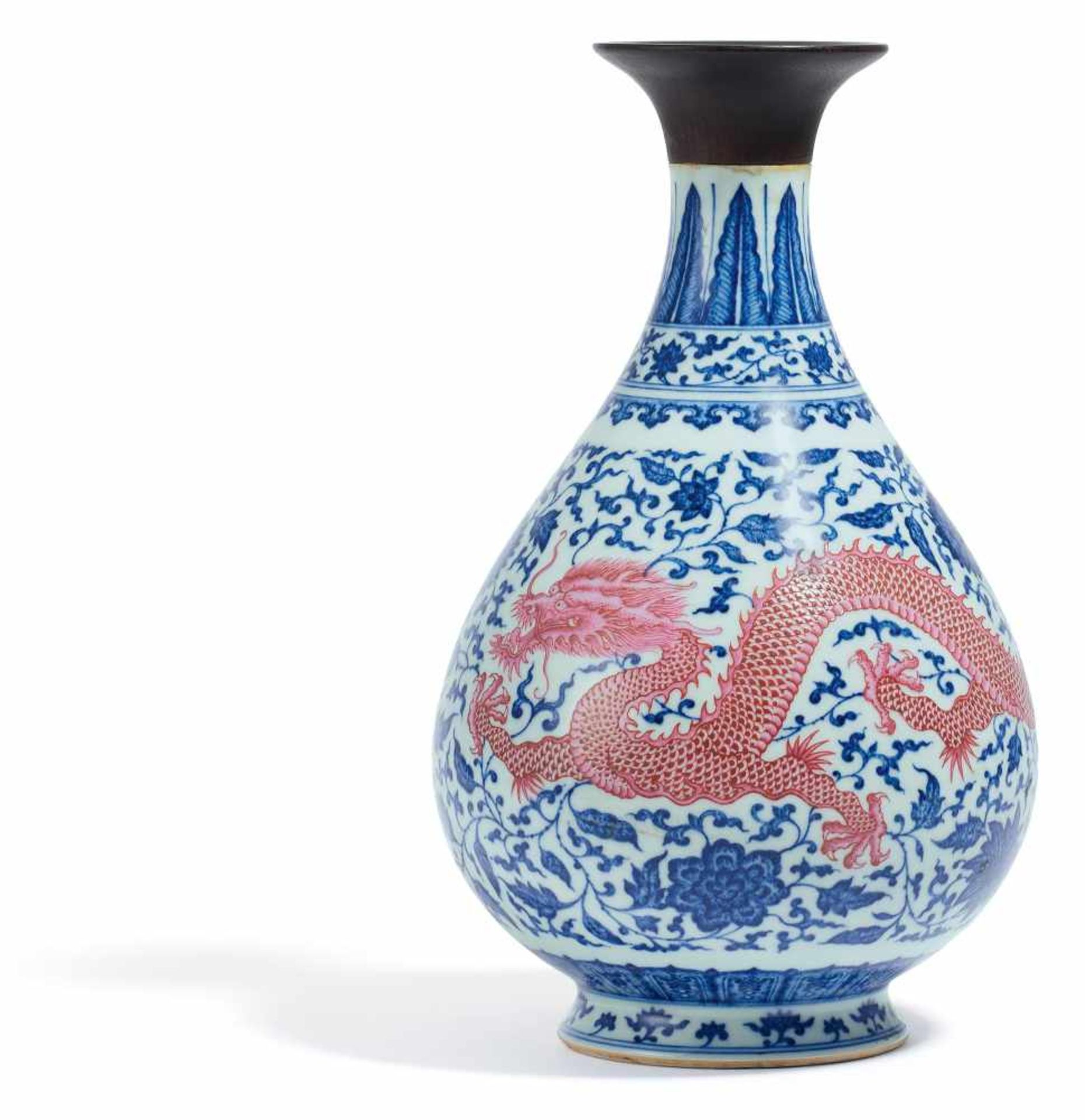 RARE YUHUCHU VASE WITH DRAGONS AMIDST FLOWER SCROLLS. China. Porcelain decorated in underglaze