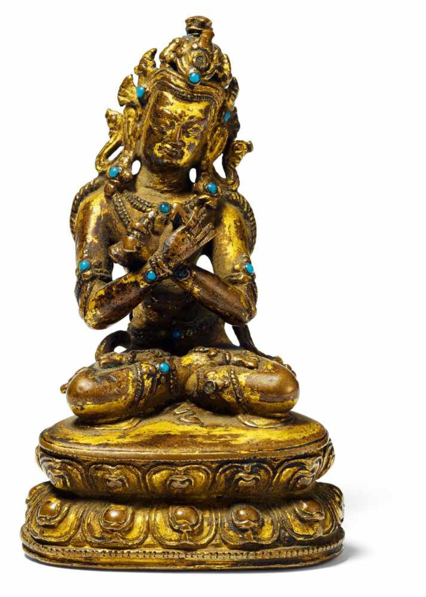 SMALL EXQUISITE FIGURE OF VAJRADHARA. Tibet. Ca. 15th/16th c. Copper bronze with residue of fire