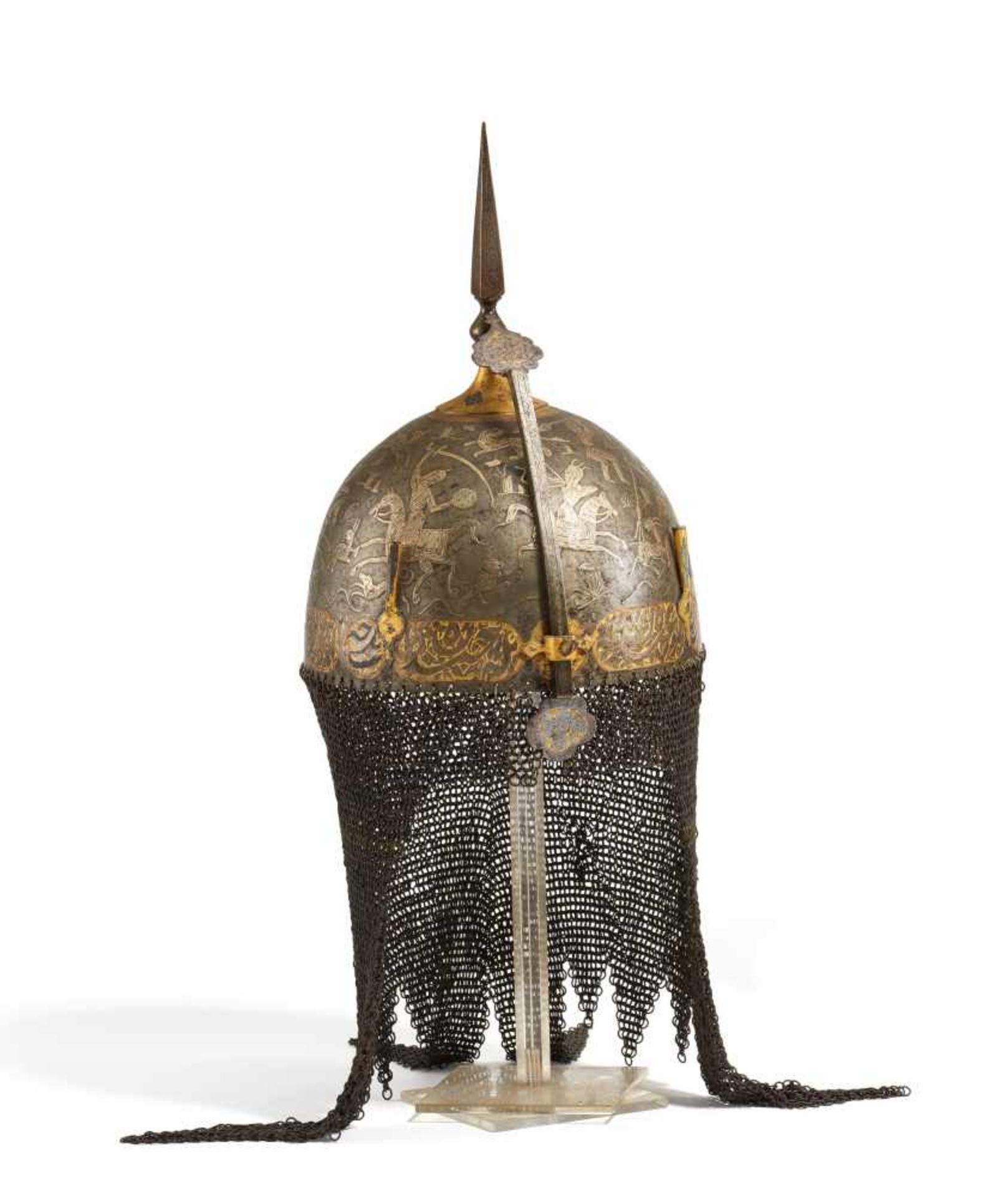 IMPORTANT HELMET (KULAH KHUD) WITH HUNTING SCENES. Mughal India/Persia. 18th c. Iron with gold and