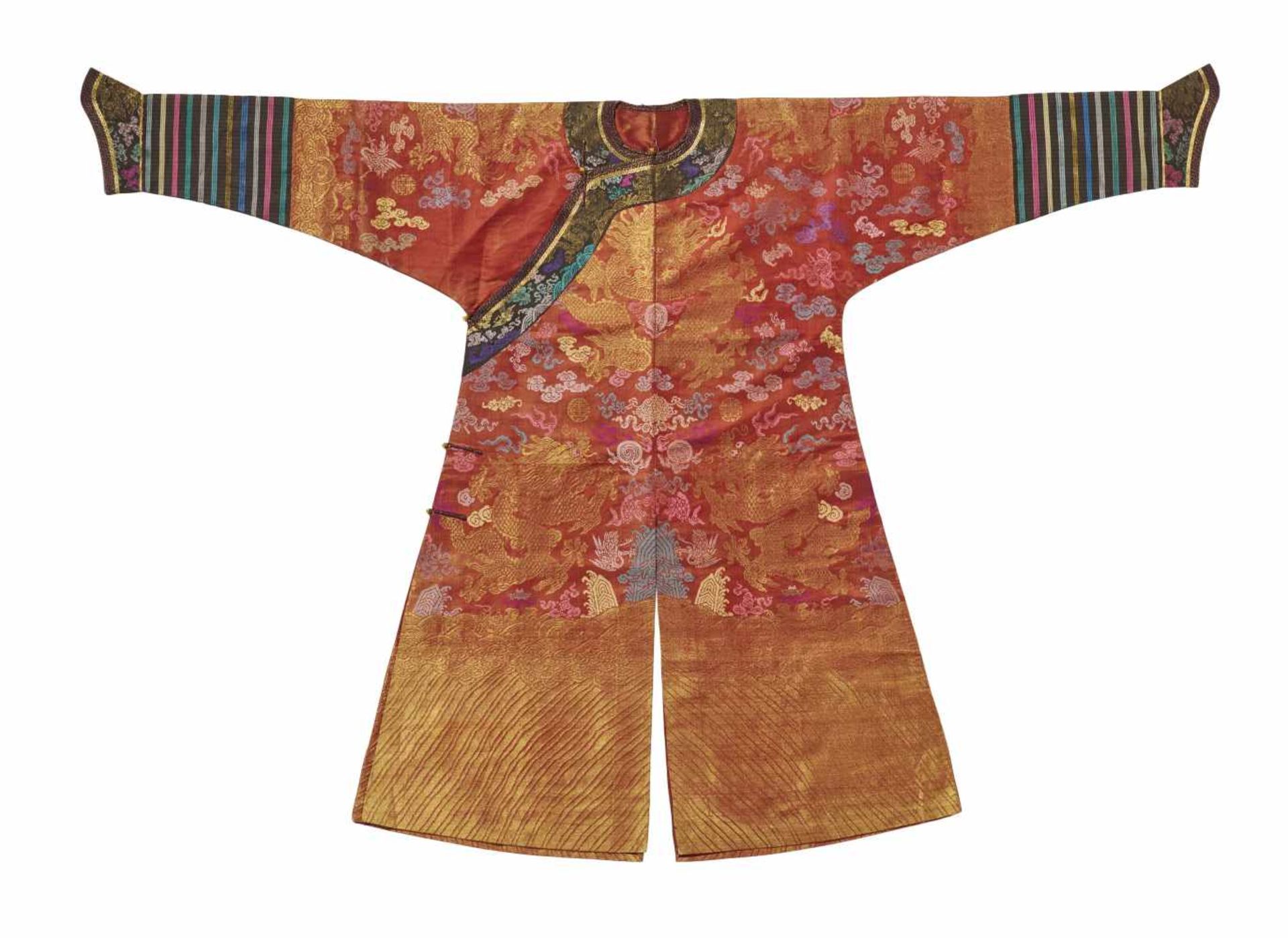 SEMI FORMAL DRAGON ROBE (JI FU). China. Qing dynasty (1644-1911). Ca. 1900. Red ground silk with