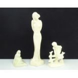 3 witplateel sculpturen met voorstelling van slanke dame, onwerp Eta Lempke en meisje op hek,