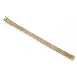 14 krt. gouden armband, lengte: 18,5 cm., breed: 11 mm., gewicht: 36,5 gram
